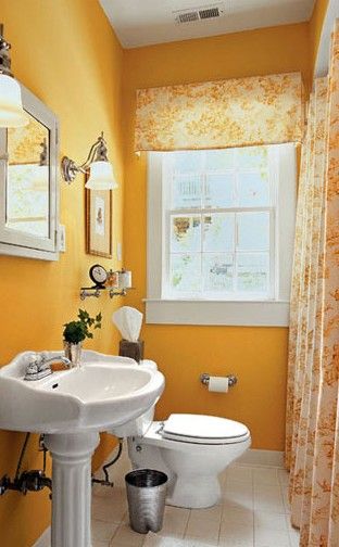 小户型的卫浴间，空间是需要解决的最大问题，橙黄色的墙面，最大限度的减少了小空间的压抑感